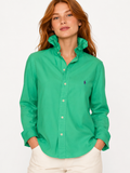 Classic menswear blending timeless tailoring with feminine charm